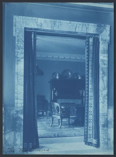 [Willard Hotel - view through a curtained doorway to a lounge], Washington D.C., 1901