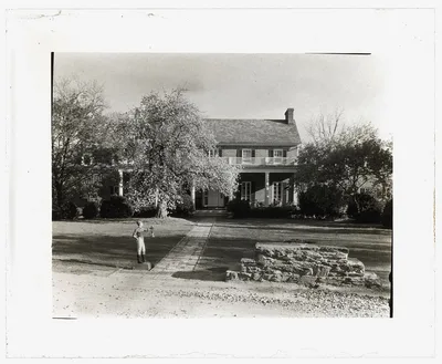 [Unidentified brick house, possibly in Virginia. Entrance pathway], 1910