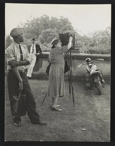 [Photographer Frances Benjamin Johnston standing beside her view…, North Carolina, Asheville, 1938