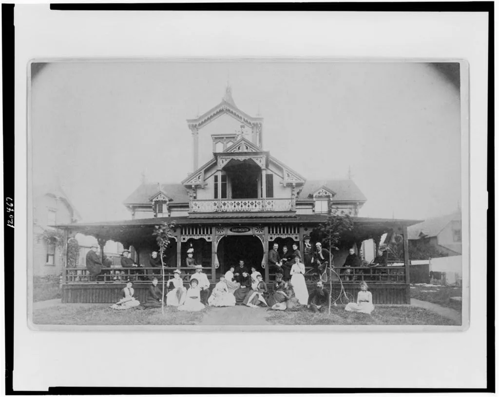 [Frances Benjamin Johnston and family on porch and in front of house], 1890