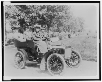 Photograph from 1890: [Frances Benjamin Johnston seated with three…
